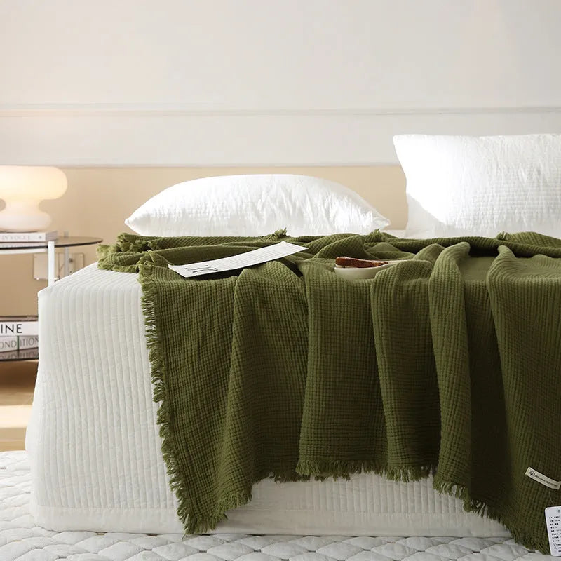 Four-layer gauze cotton blanket with tassel trim in various colours