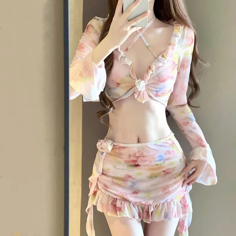 Women's floral bikini swimsuit in cherry blossom pink with matching floral print on both pieces