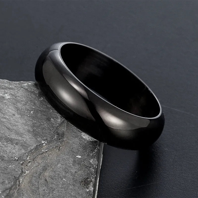 Glossy electroplated titanium steel ring shown in gold, black, and steel colours on size display