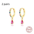 Sterling silver water drop earring with crystal pendant in gold or silver tone.