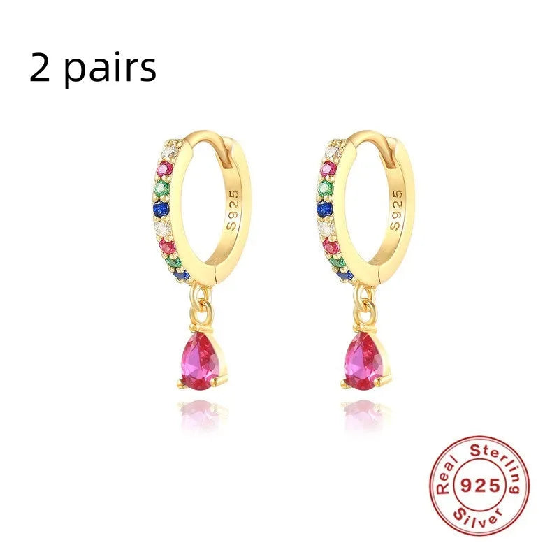 Sterling silver water drop earring with crystal pendant in gold or silver tone.