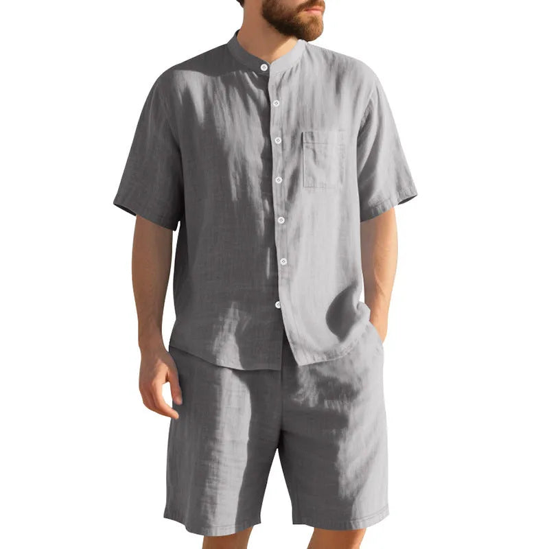 Men's light blue linen short sleeve suit jacket and shorts on a hanger for summer casual wear.