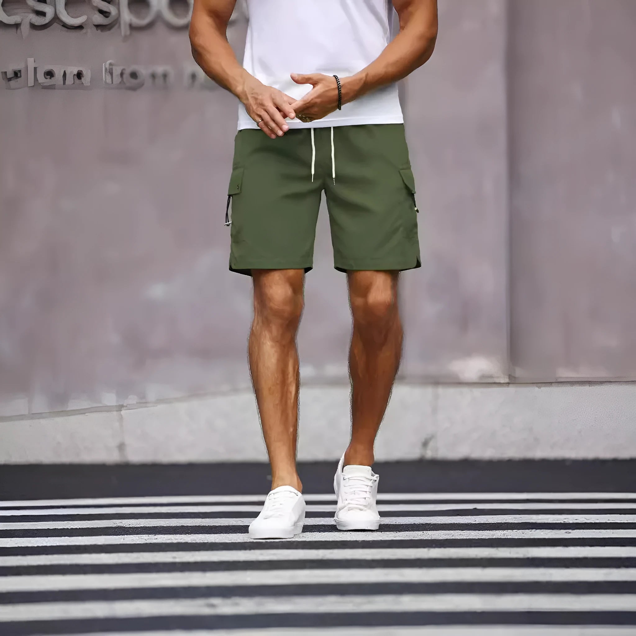 Men's loose fit work shorts in army green with straight leg design and fifth pants length