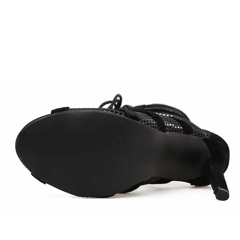 Black suede women's high-heel shoes with lace-up front and stiletto heel
