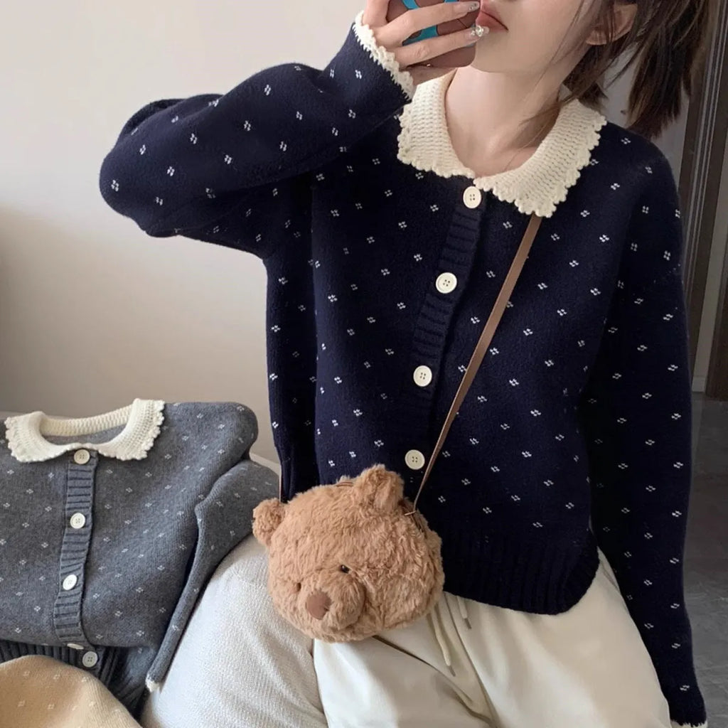 Knitted cardigan coat with Peter Pan collar in navy blue with floral pattern