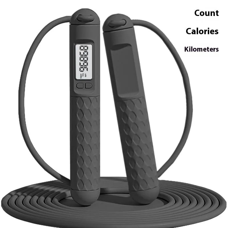 ABS plastic skipping rope with ball-bearing mechanism in various colour options including black, green, navy blue, and pink.