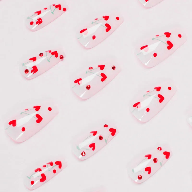 Pack of 24 French Love Red Diamond Small Cherry nail art armour sheet stickers with a tube of adhesive glue.