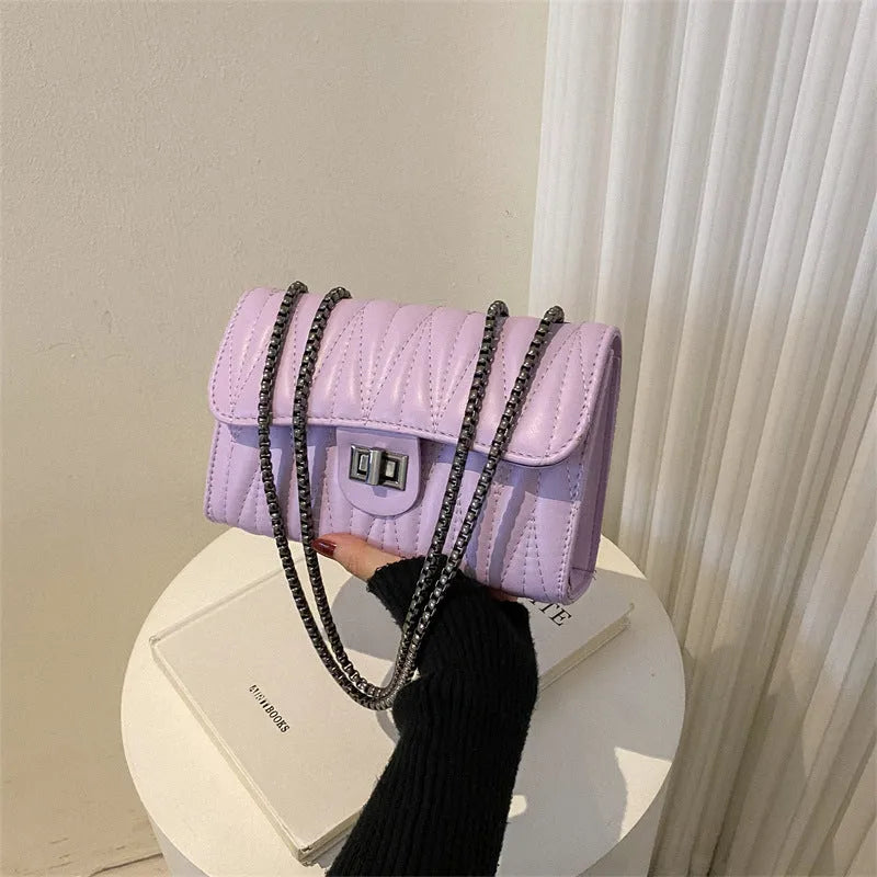 Retro textured diamond pattern small PU leather shoulder bag in a horizontal square shape, shown in beige colour.
