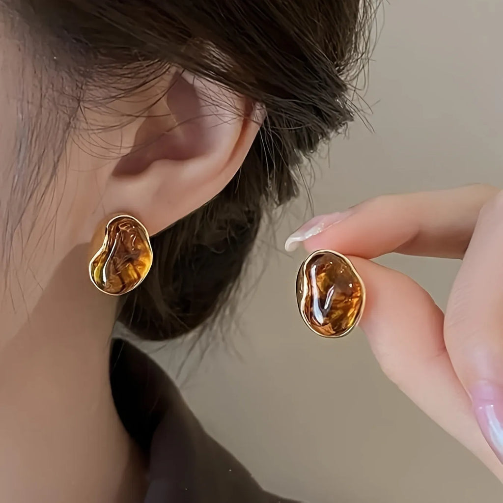 Handmade geometric alloy earrings with tassels in three styles: round, irregular, and teardrop