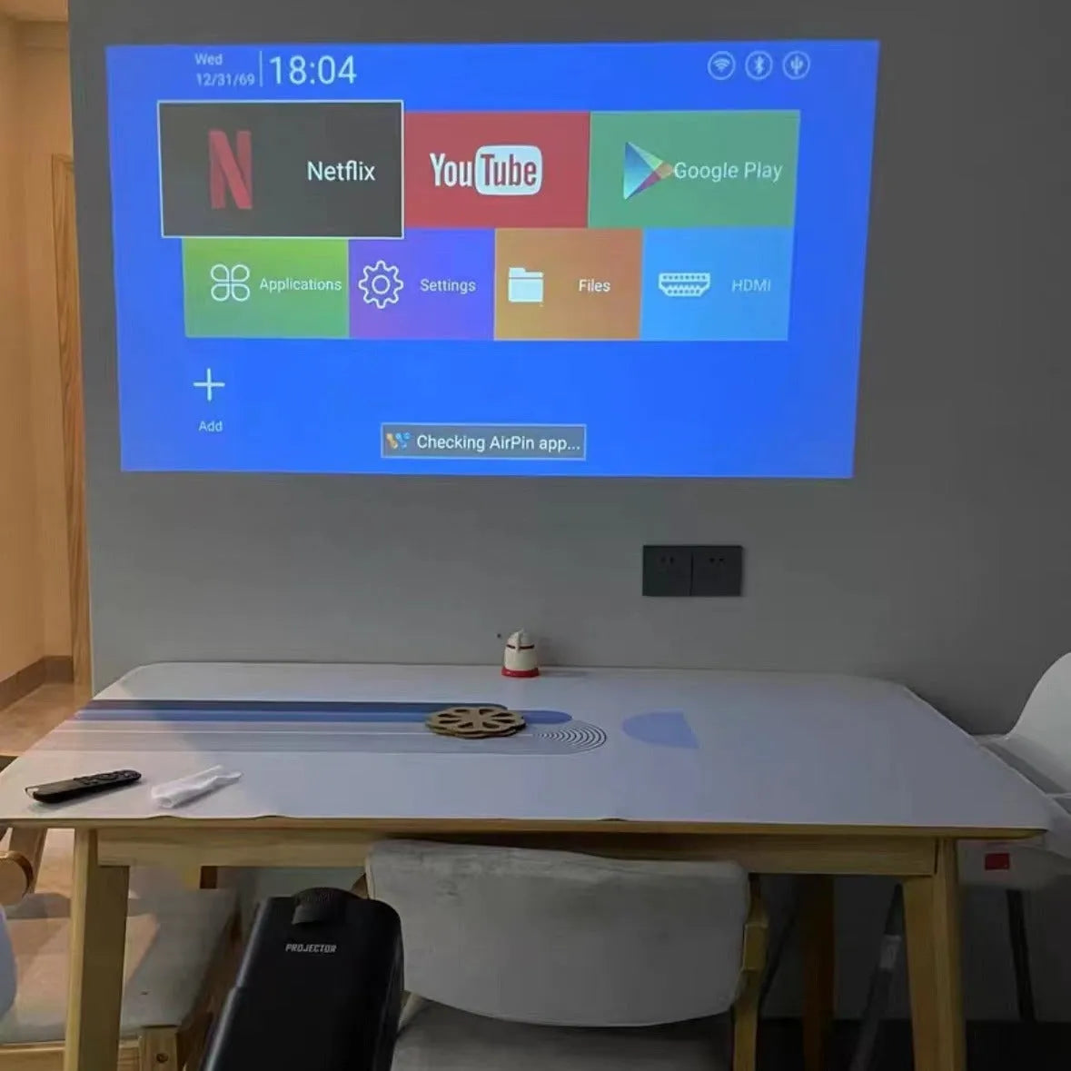 720p HD home projector with portable handle showing wireless connectivity ports