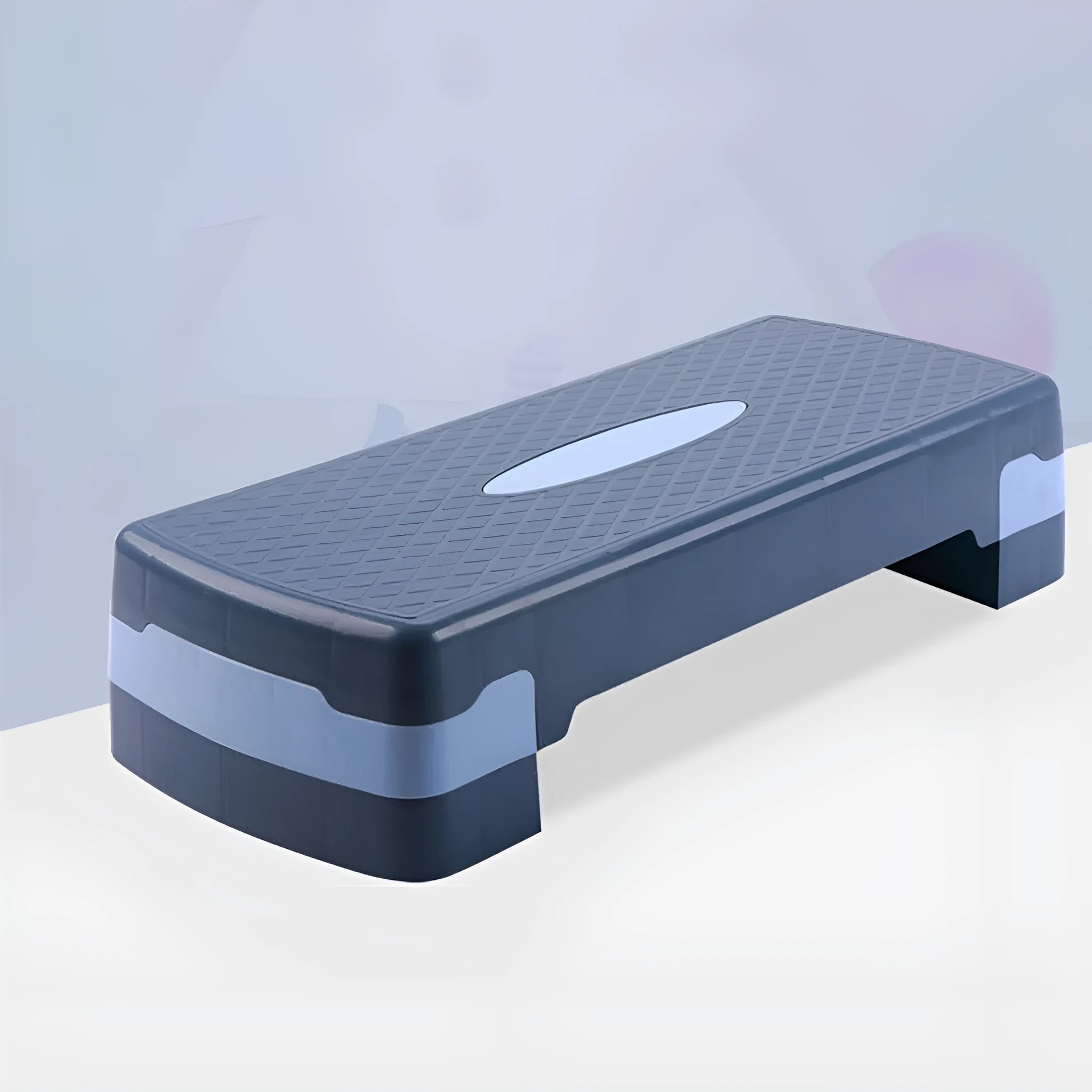 Grey Fit Step aerobics platform on a wooden floor for home fitness workouts.