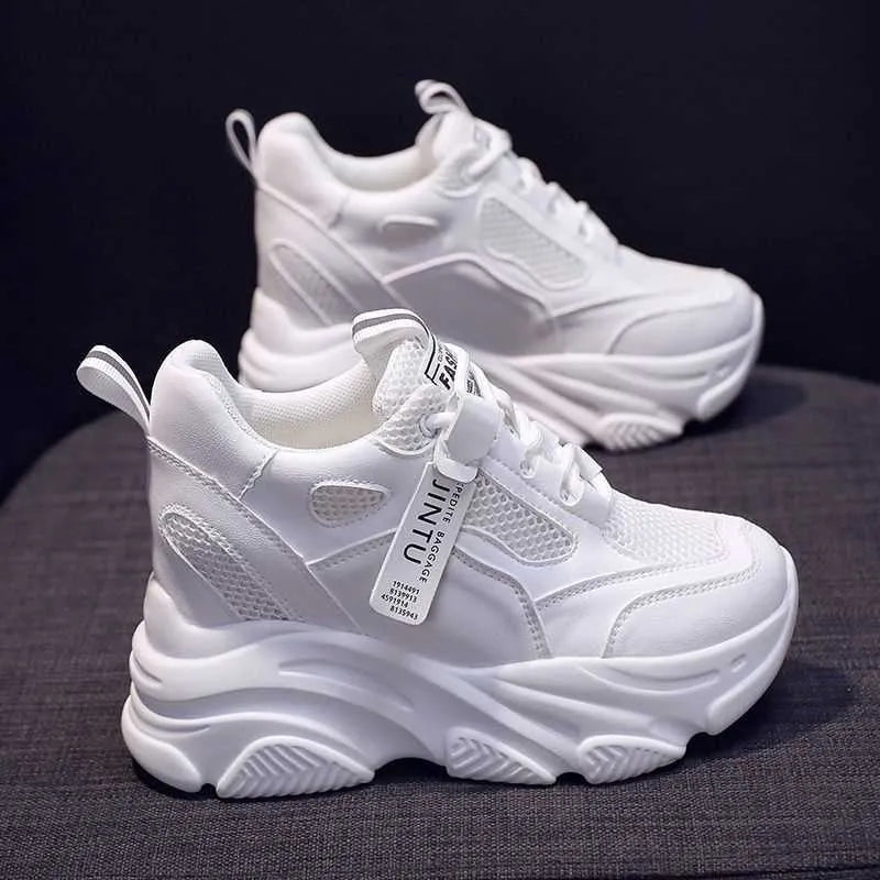 Women's black mesh platform casual shoes with toe holder design on a white background.