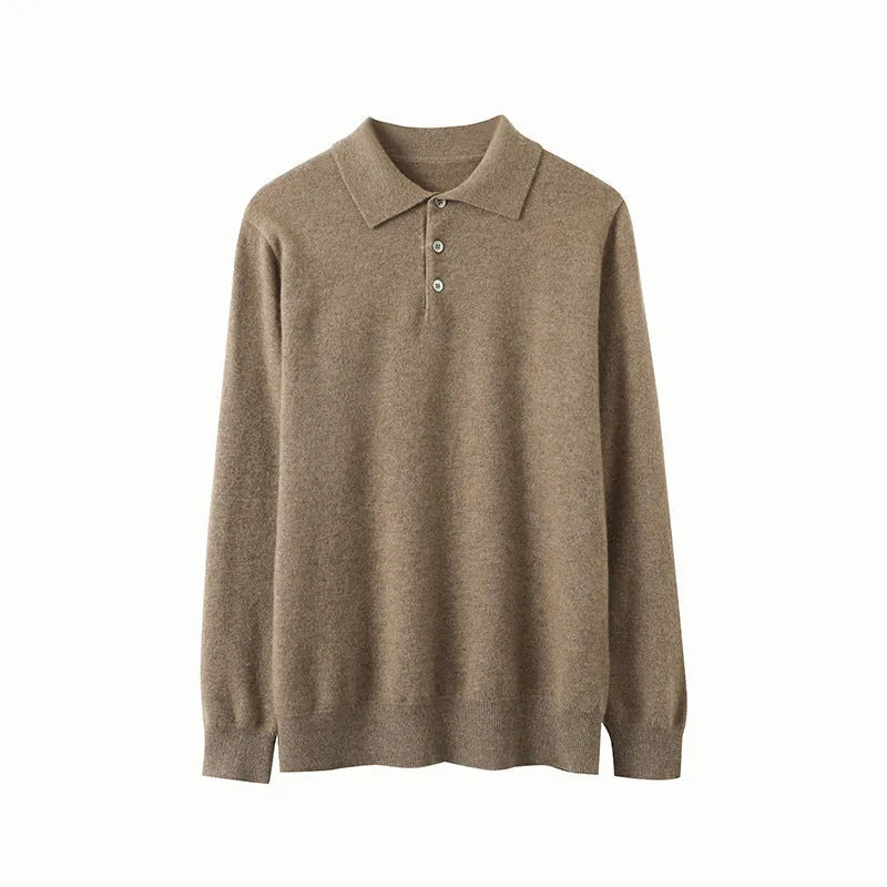 Man wearing a sapphire blue loose-fit cashmere polo collar pullover sweater.
