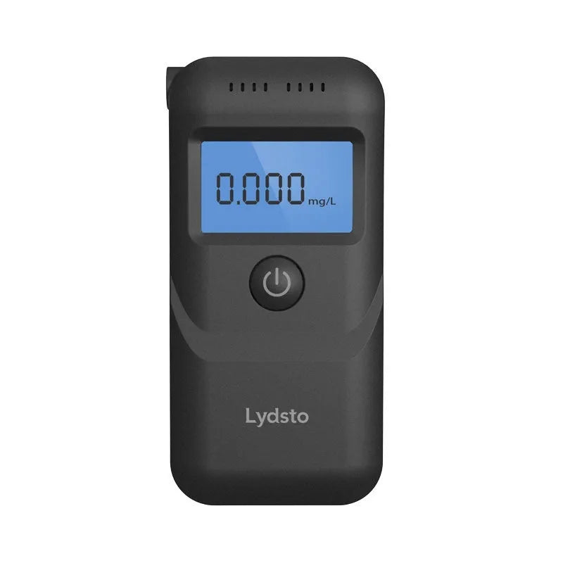 Black handheld household alcohol tester for breath checks and drunk driving detection