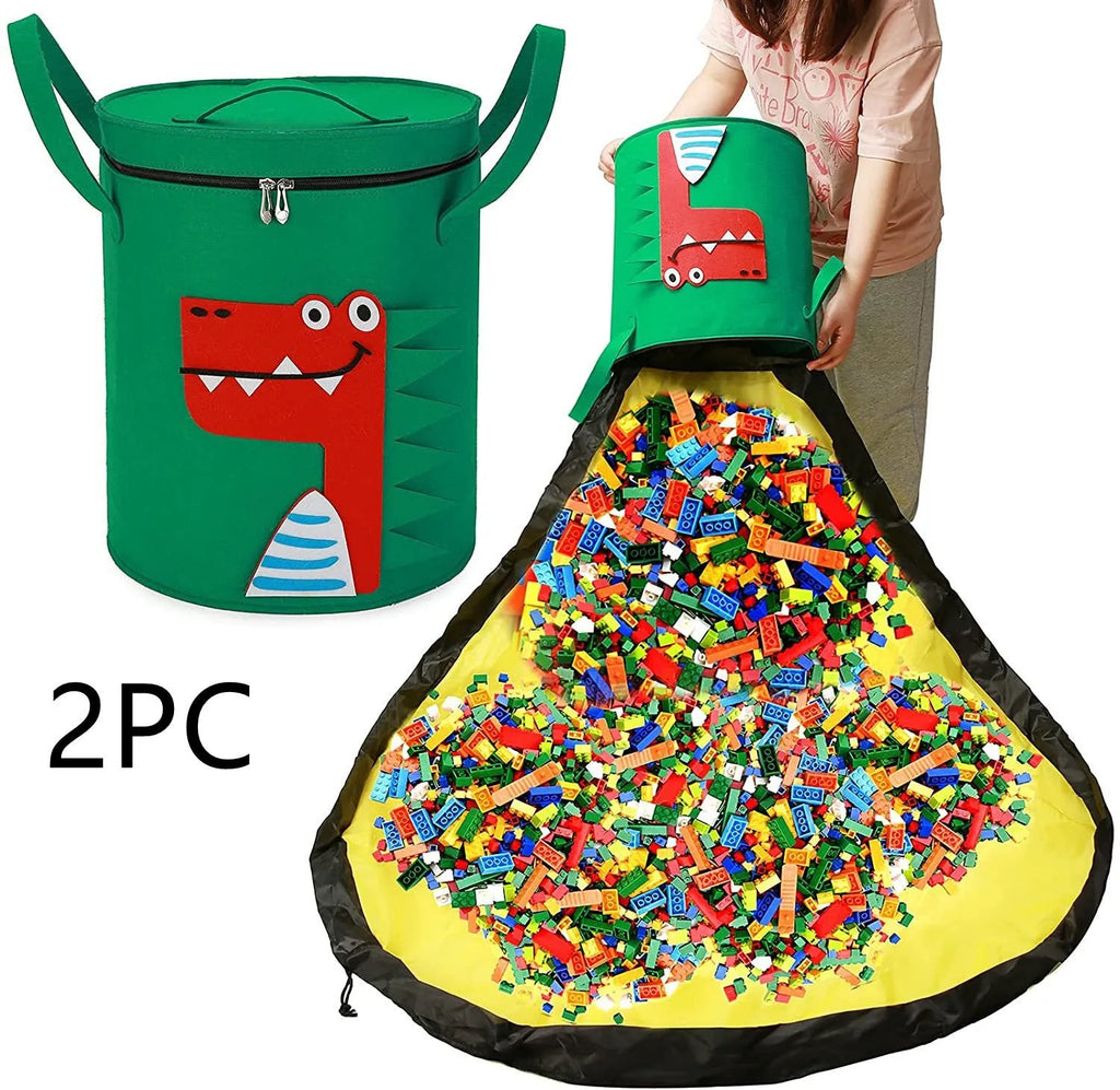 Green felt cube storage bag with a pull rope, shown unfolded as a flat play mat for toys.