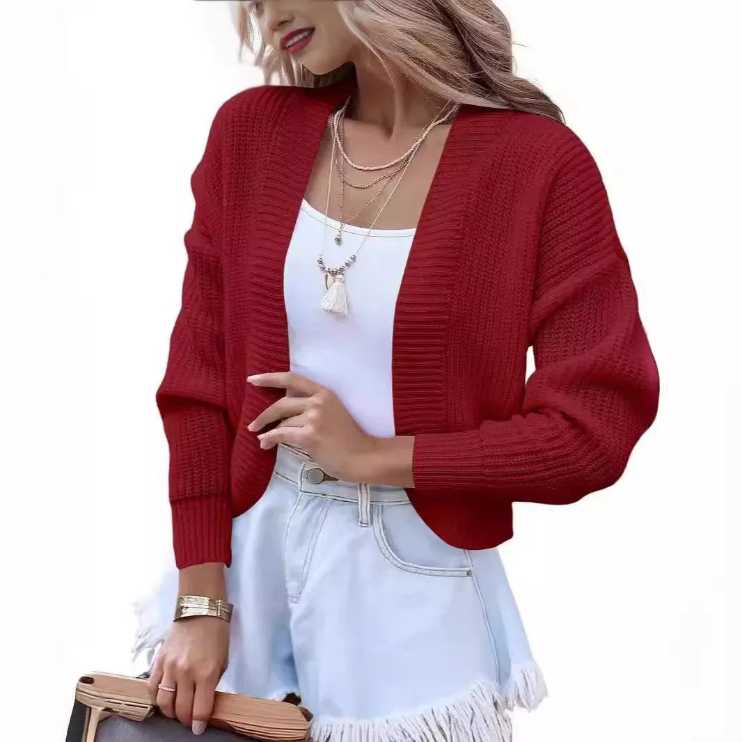 Women's short cape knitted cardigan sweater in camel solid colour with long sleeves and polyester fabric