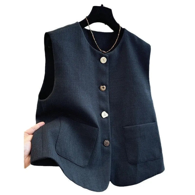Women's French-style sleeveless bandage vest in beige, shown on a model, with a round neck and fitted silhouette.