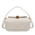 Personalised letter embroidery on a women's beige PU leather shoulder messenger bag with adjustable strap.