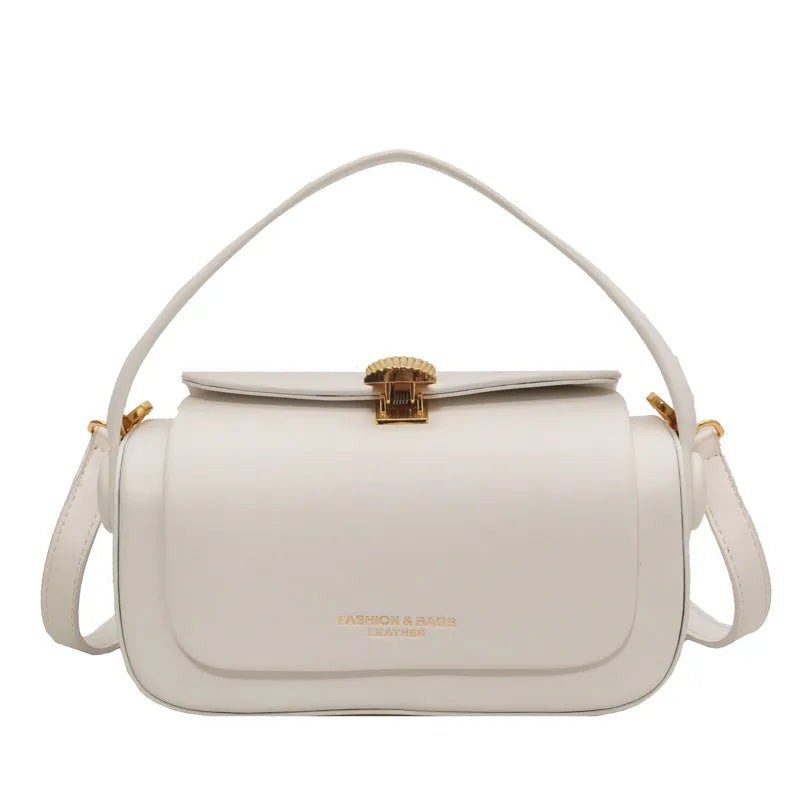 Personalised letter embroidery on a women's beige PU leather shoulder messenger bag with adjustable strap.