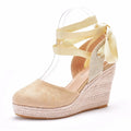 Women's round toe platform wedge sandals with buckle closure and beaded tassels on artificial PU upper