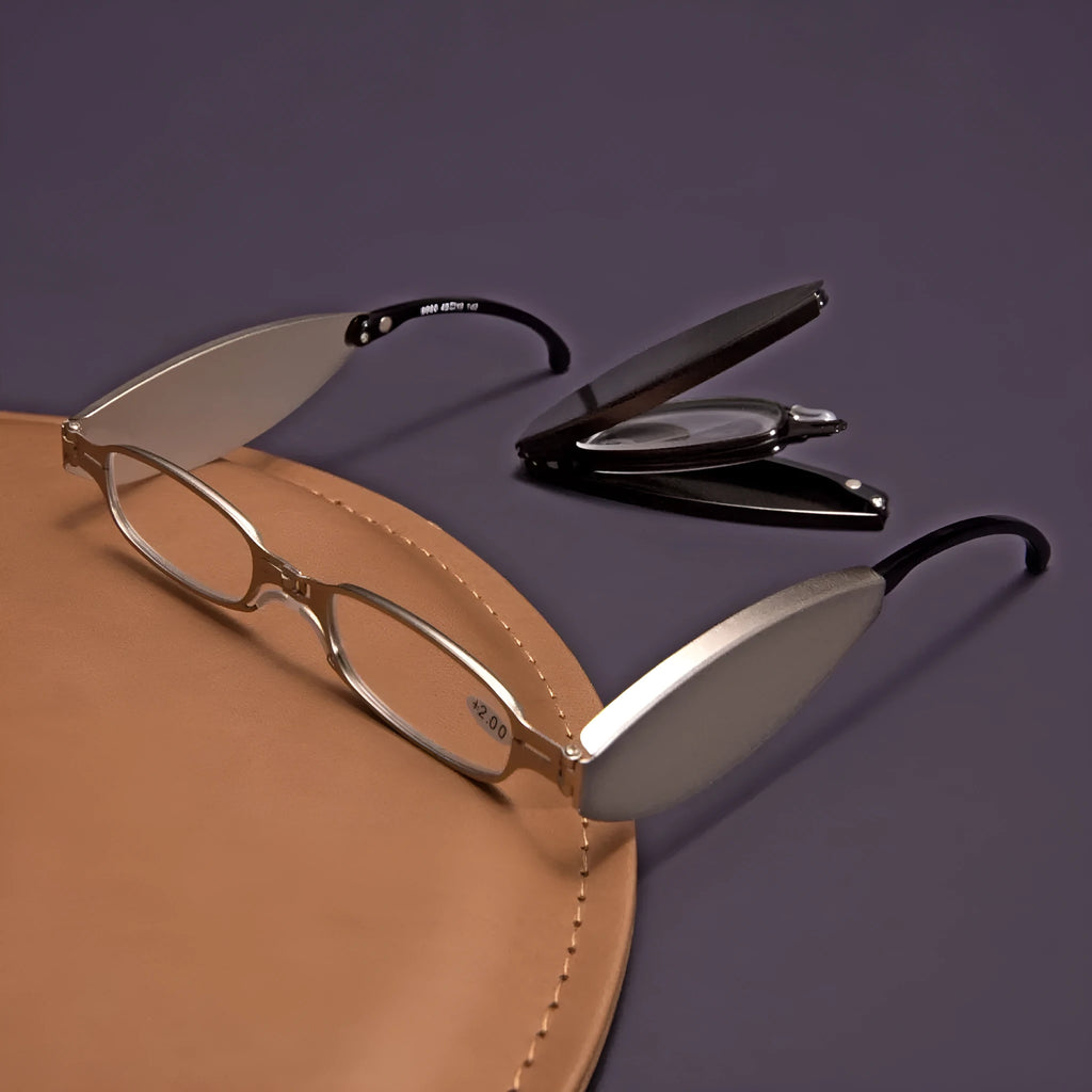 Folding presbyopic glasses with retro ring design in black frame collapsed for pocket storage