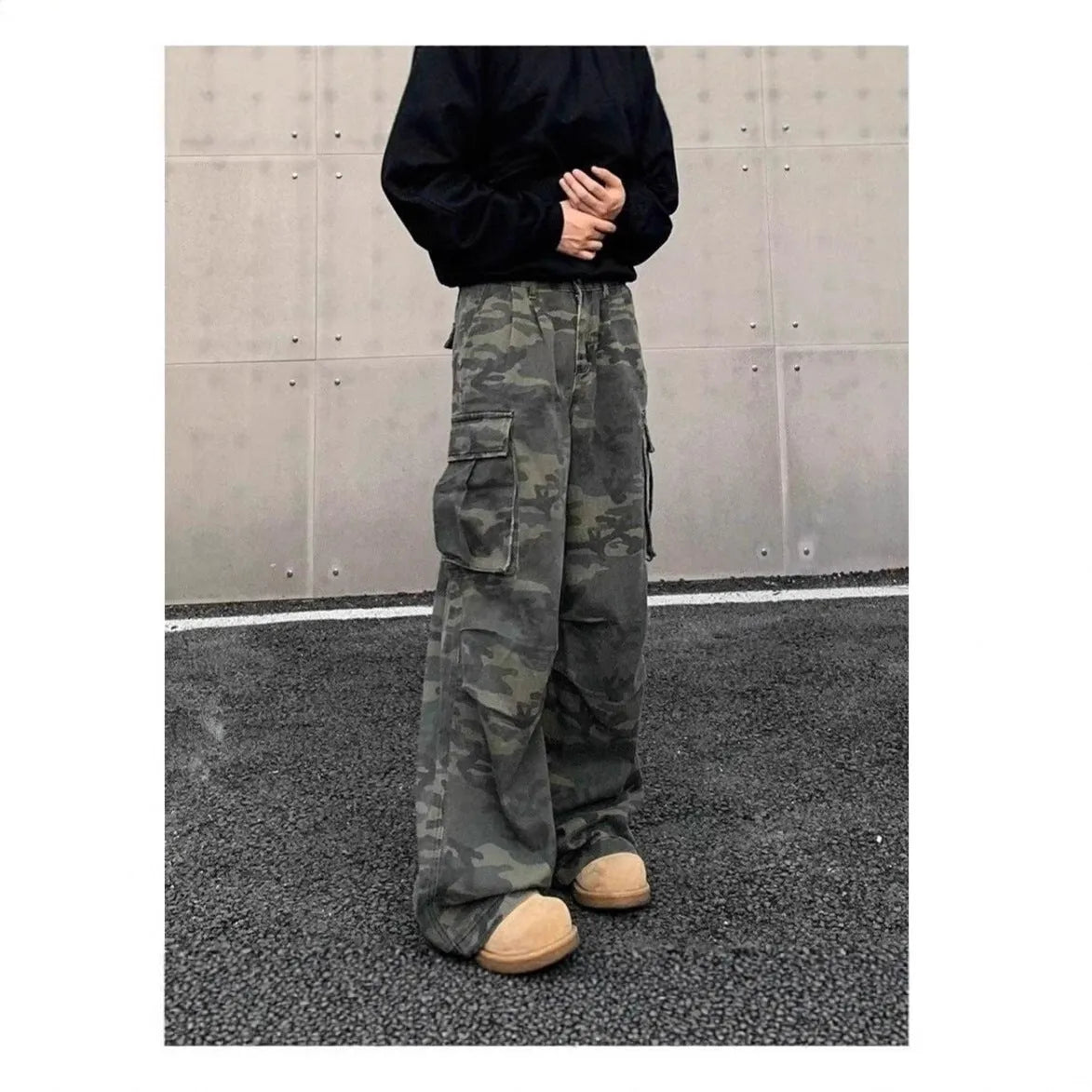 American vintage washed camouflage cotton blend cargo pants with multiple pockets on a mid waist.