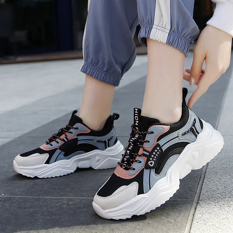 Women's white and moonlight coloured sports shoes with mesh upper and thick sole