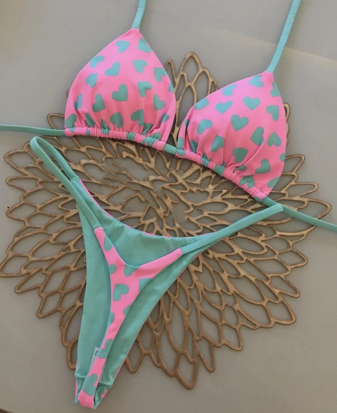 Heart print swimsuit set with backless design and split leg styling in nylon fabric