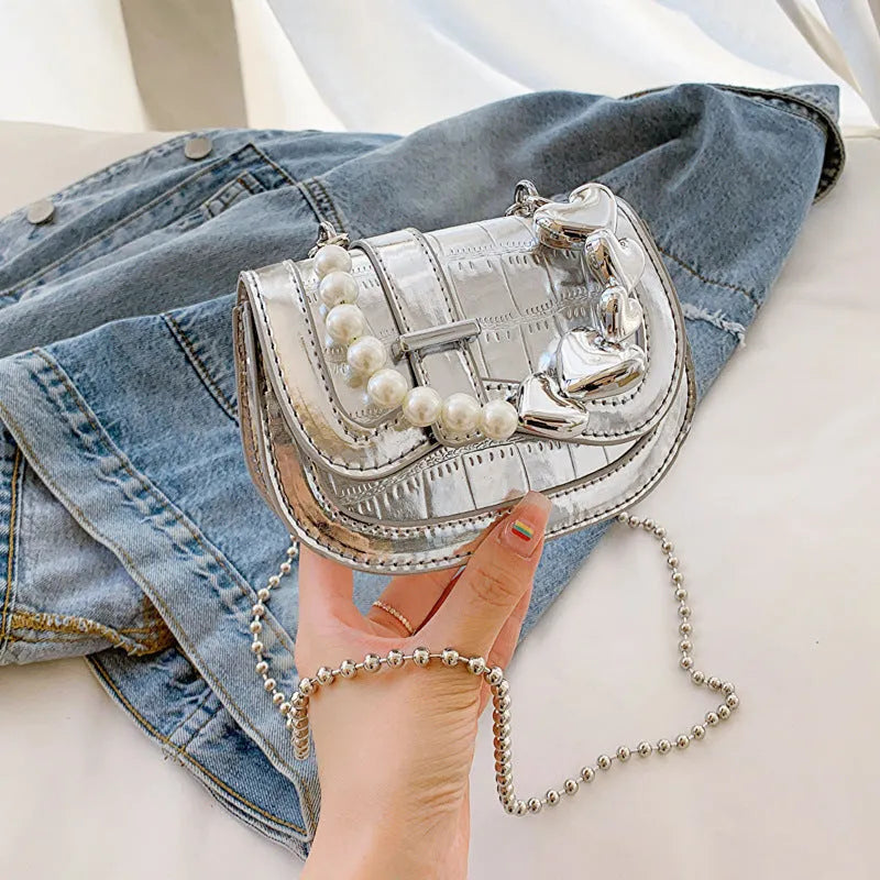 Women's silver mini tote saddle crossbody bag with mobile phone pocket and synthetic leather lining