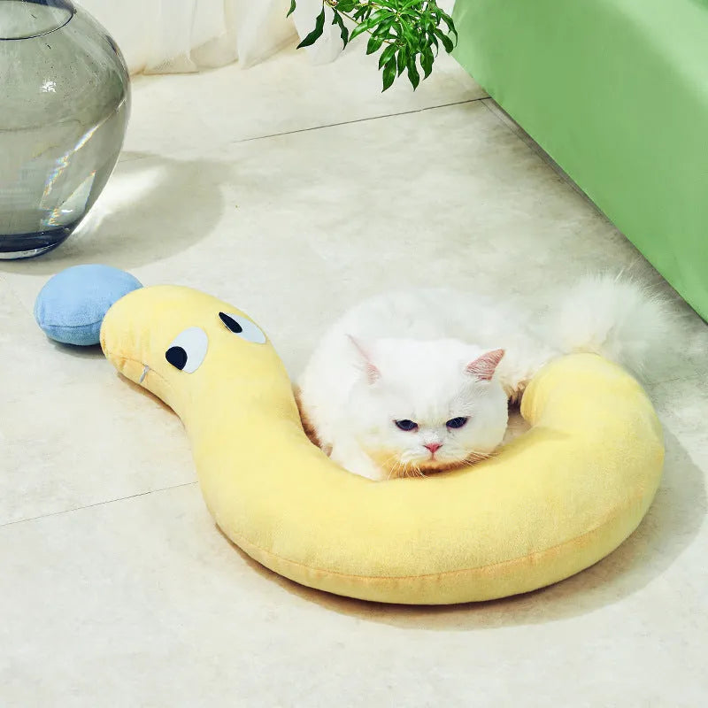Blue and yellow rectangular pet sleeping pillow for cats and dogs on a white background.