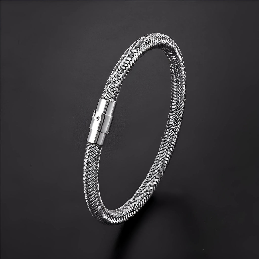 Titanium steel geometric wire bracelet with a magnetic clasp shown on a wrist.