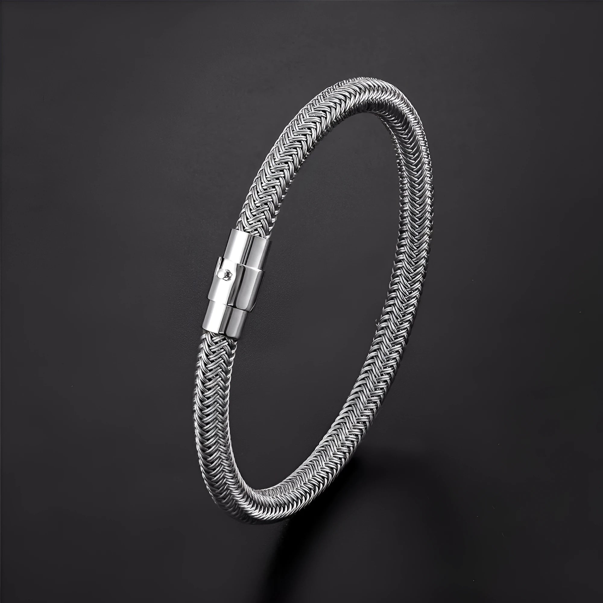 Titanium steel geometric wire bracelet with a magnetic clasp shown on a wrist.