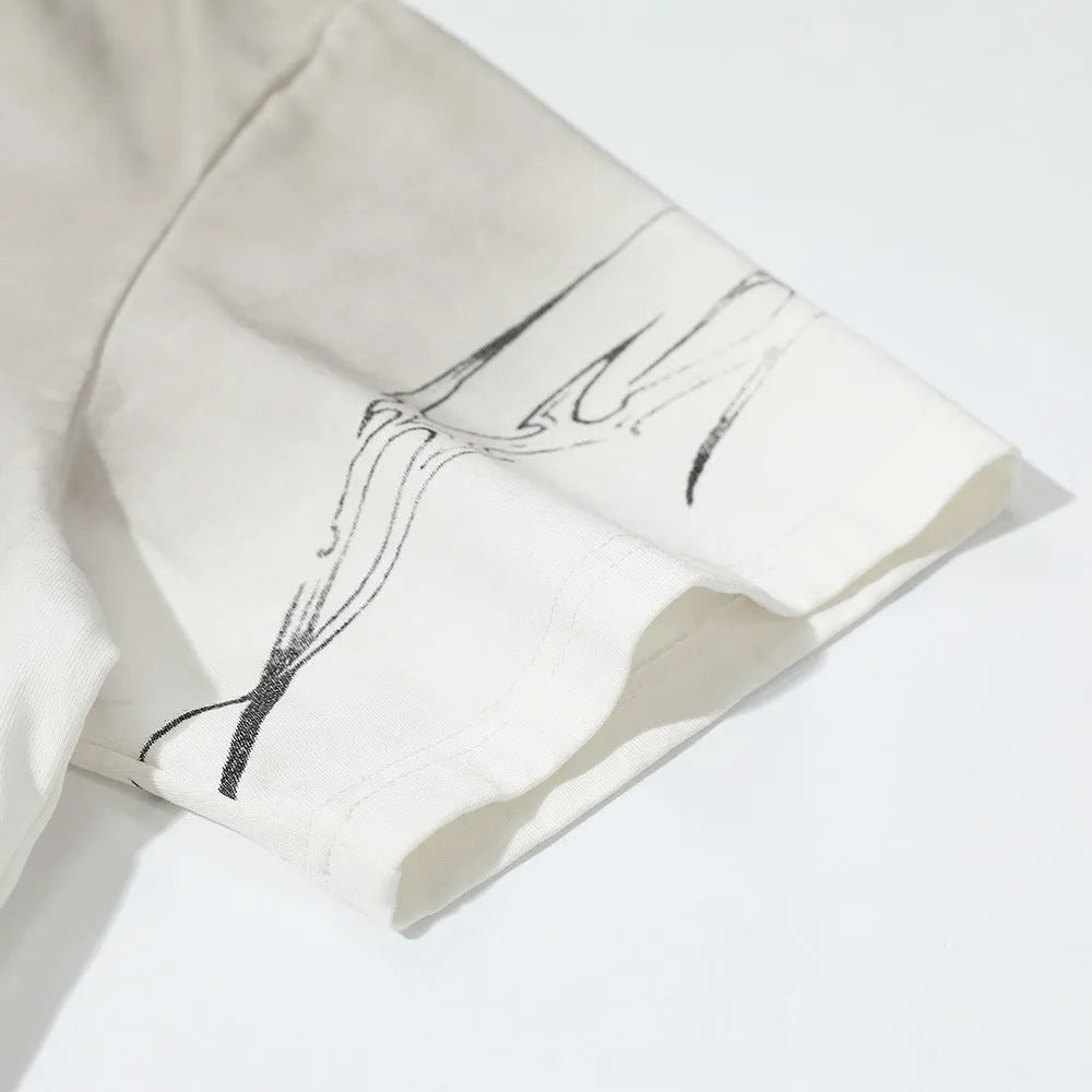 A man's short-sleeved printed t-shirt in pure cotton, shown in black and white colour options.