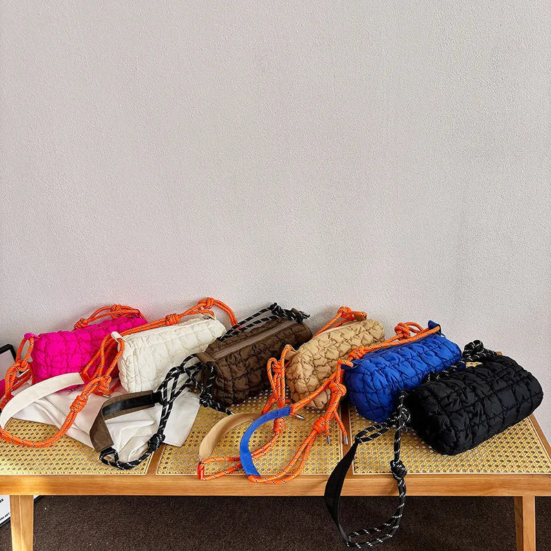Women's lightweight nylon messenger bag in pillow shape with rhombus pattern and adjustable crossbody strap