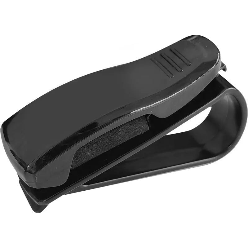 Black plastic car sun visor clip holding sunglasses and cards, measuring 6.5cm by 2.3cm