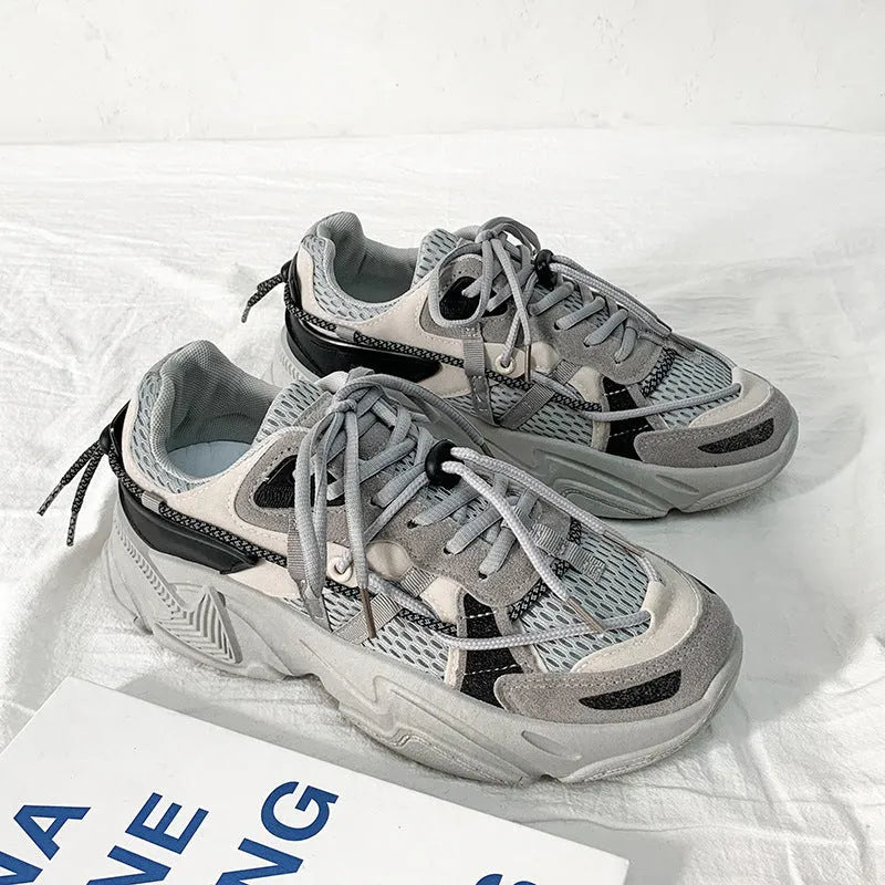 Men's Korean style platform dad sneakers in black, white, and grey colours with front lace-up closure