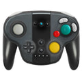 Black wireless gamepad with NFC reader, for Nintendo Switch and Windows PC, beside its USB-C cable and colour packaging box.