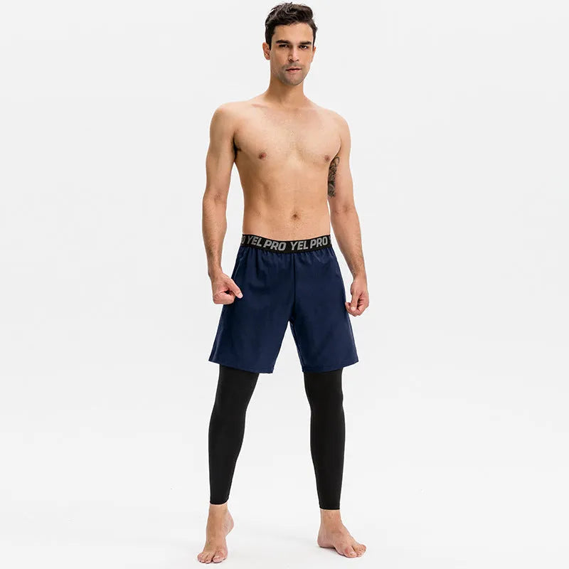 Men's grey quick-drying high elastic tight pants for fitness exercise on a model