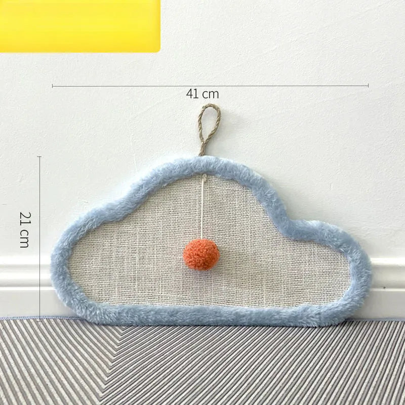 White cat scratching mat with sleeping cat pattern design mounted on wall