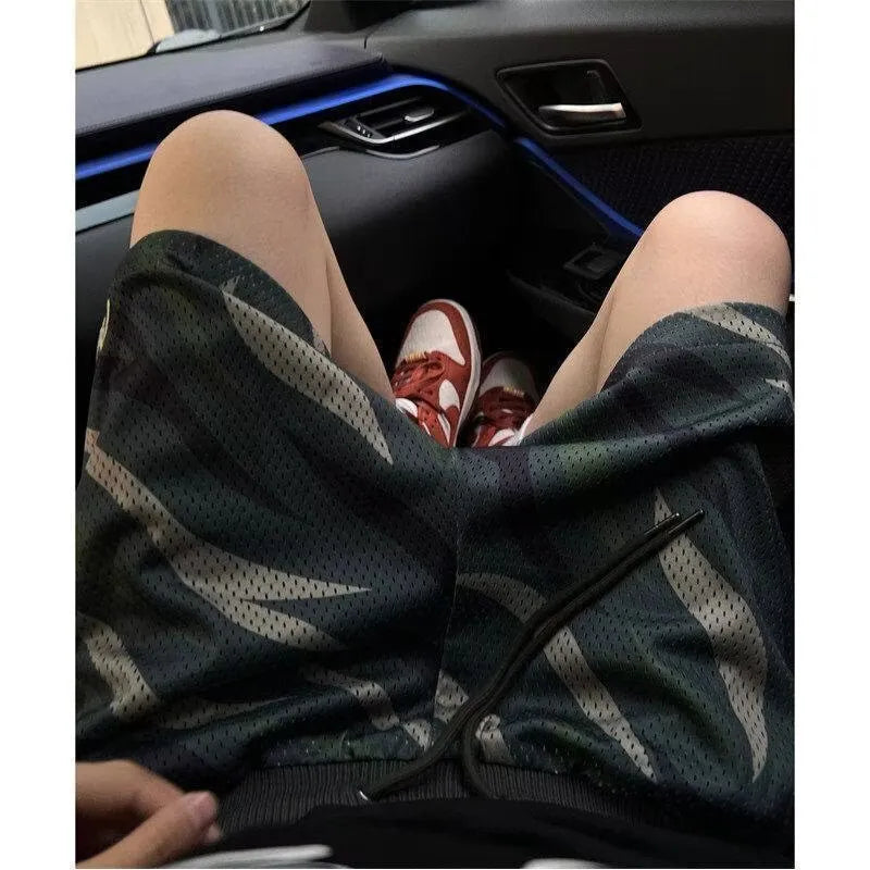 Men's camouflage pattern cotton blend mesh shorts with straight leg cut