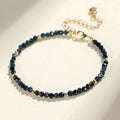 Blue tourmaline 3mm bead bracelet with spacer design on wrist