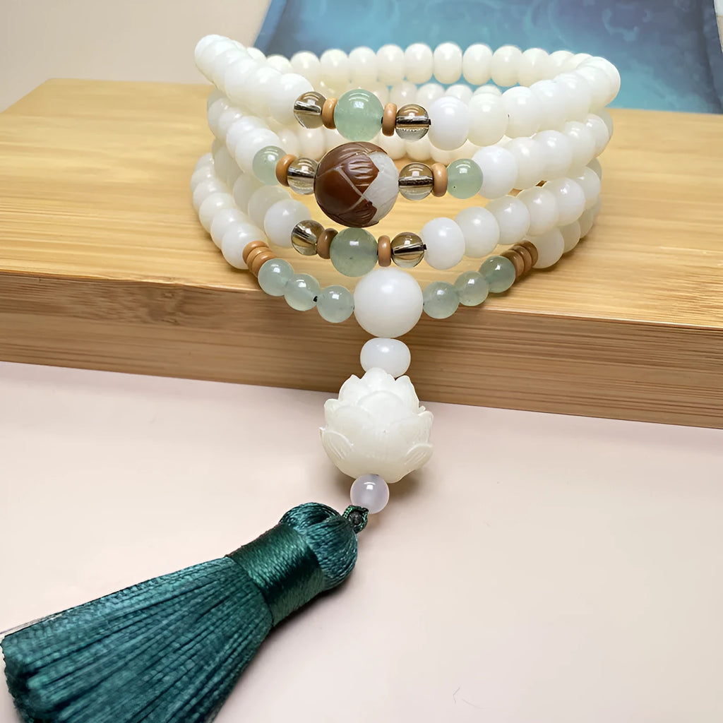 White Jade Bodhi beaded bracelet with 108 beads, shown in three different size and style variations.