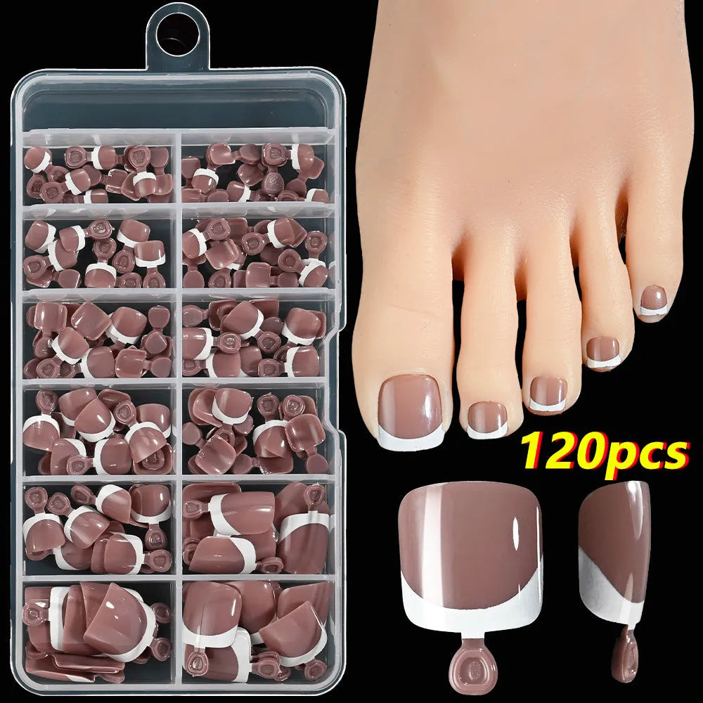 120 piece box of French white edge nude artificial toenails in nine shades, square short shape for toes.
