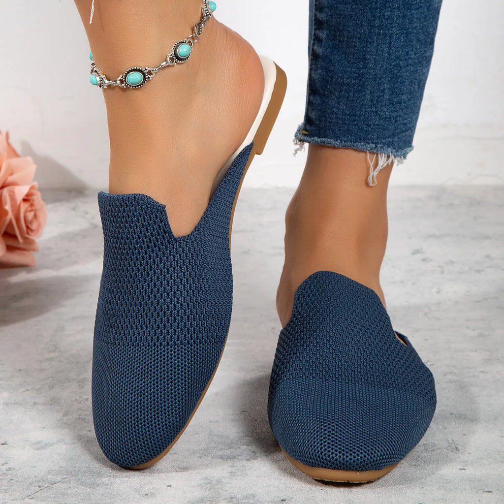 Women's apricot mesh slip-on sandals with round toe and flat rubber sole on a plain background.