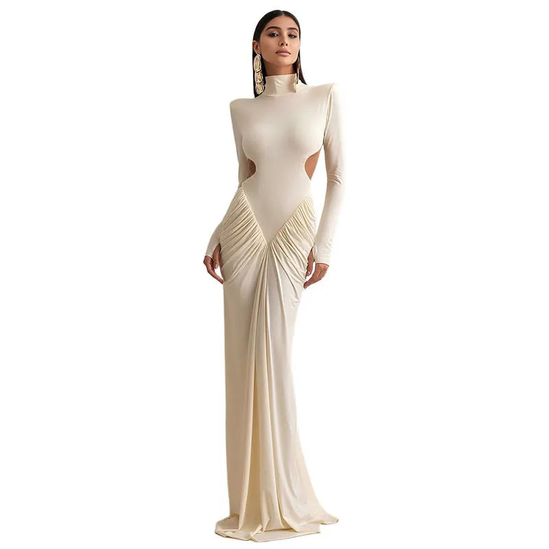 Women's slim fit long sleeve dress with high collar and pleated backless detail in a solid colour.