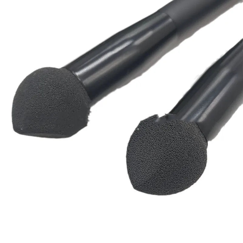 Black wooden-handle concealer brush with triangle sponge tip for dark circles