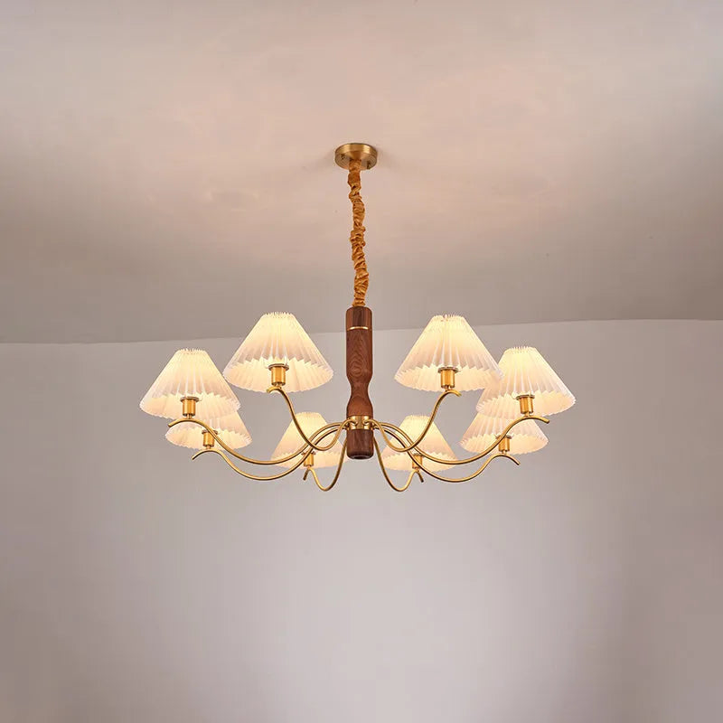 American retro rubber wood and fabric wall lamp in walnut finish on a wall.