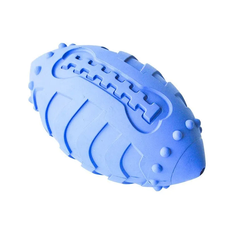Light green rugby ball shaped dog chew toy with textured rubber surface for interactive play