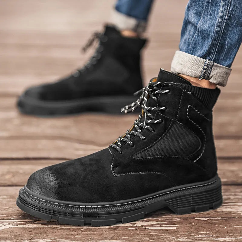 Men's vintage round toe Martin boots in black, grey, and sand colours with a low thick heel.