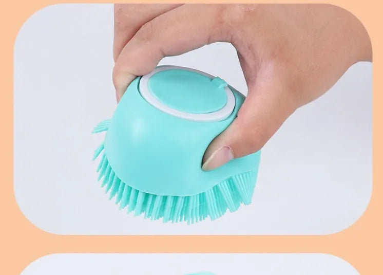 Blue silicone dog bath brush with finger loop and soft bristles for pet grooming